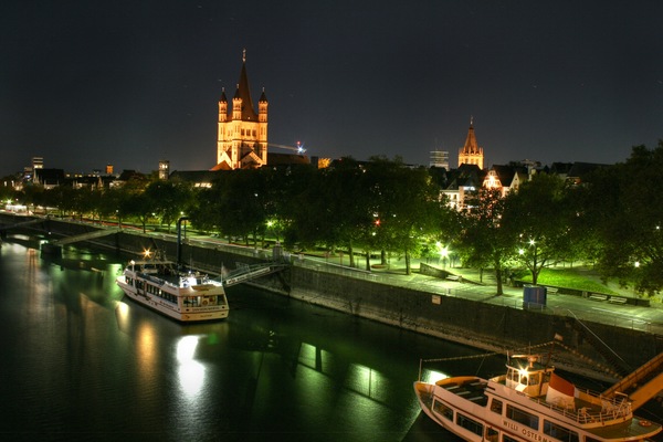 DECGN - Cologne - Hohenzollern Bridge, Western Bank of the Rhine, Great St. Martin's Church in the Background, by Night - Credits GNTB Media-Services GmbH Dancker Robert.jpg